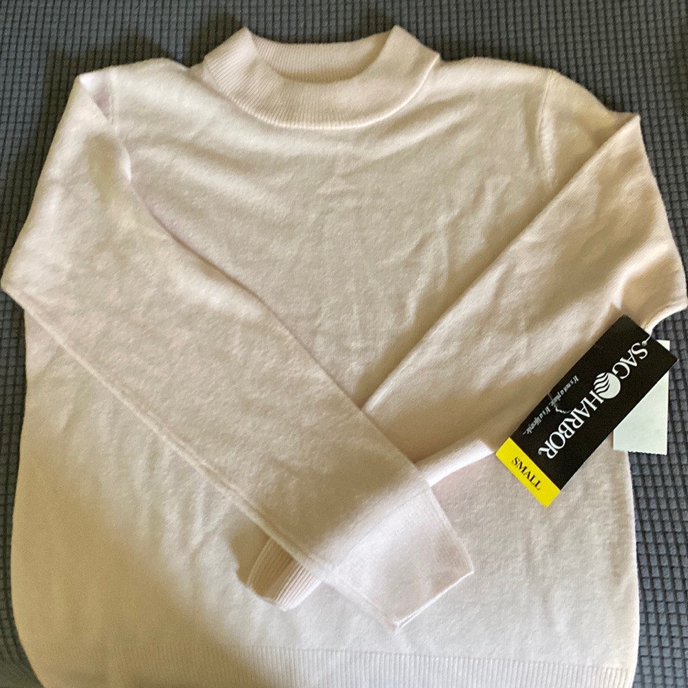 Ladies size small sweater, new with tag